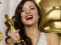 587640_france-s-marion-cotillard-holds-oscar-she-won-for-best-actress-at-the-80th-annual-academy-awards-in-hollywood